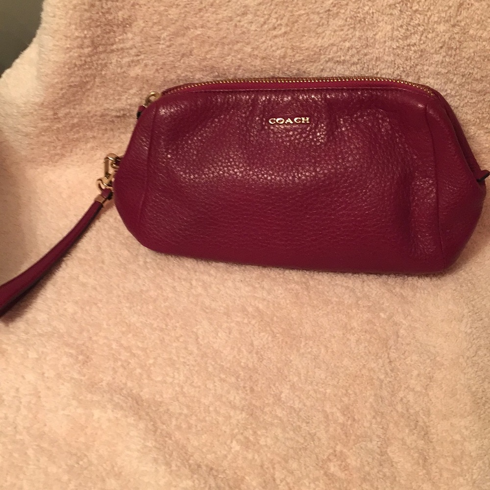Coach wristlet berry color